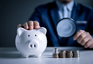 Sparschwein und Geldstücke